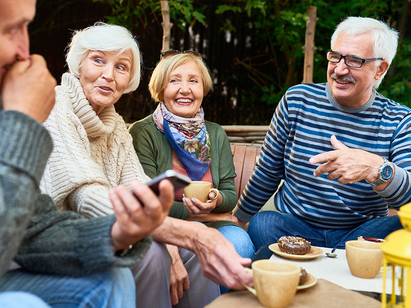 image of elderly group laughing together